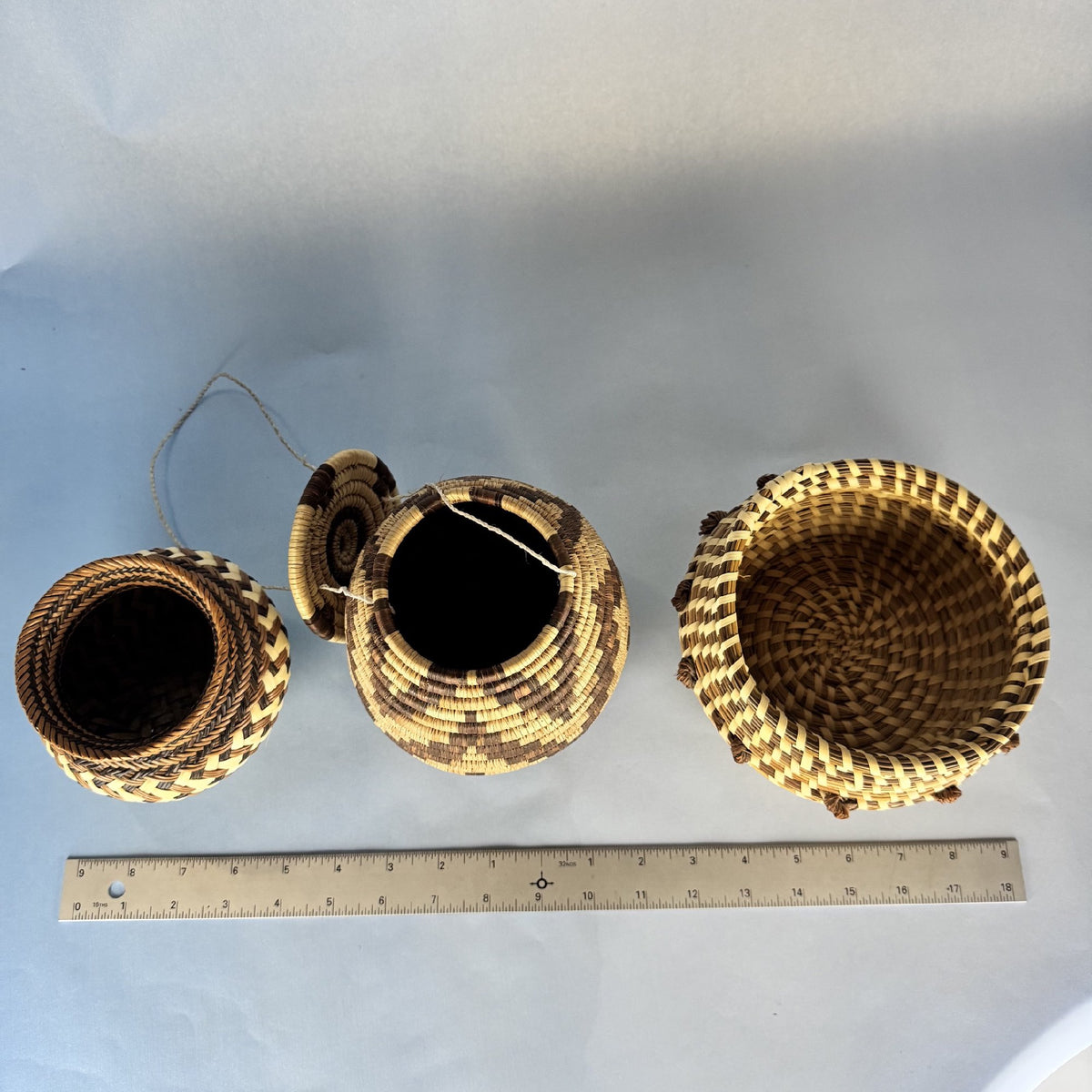 Trio of Handcrafted Baskets in Natural and Brown