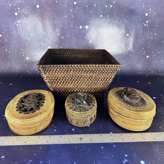 Three Oval-Lidded Woven Boxes with Carved Wooden Animal Figurines and Square Woven Container