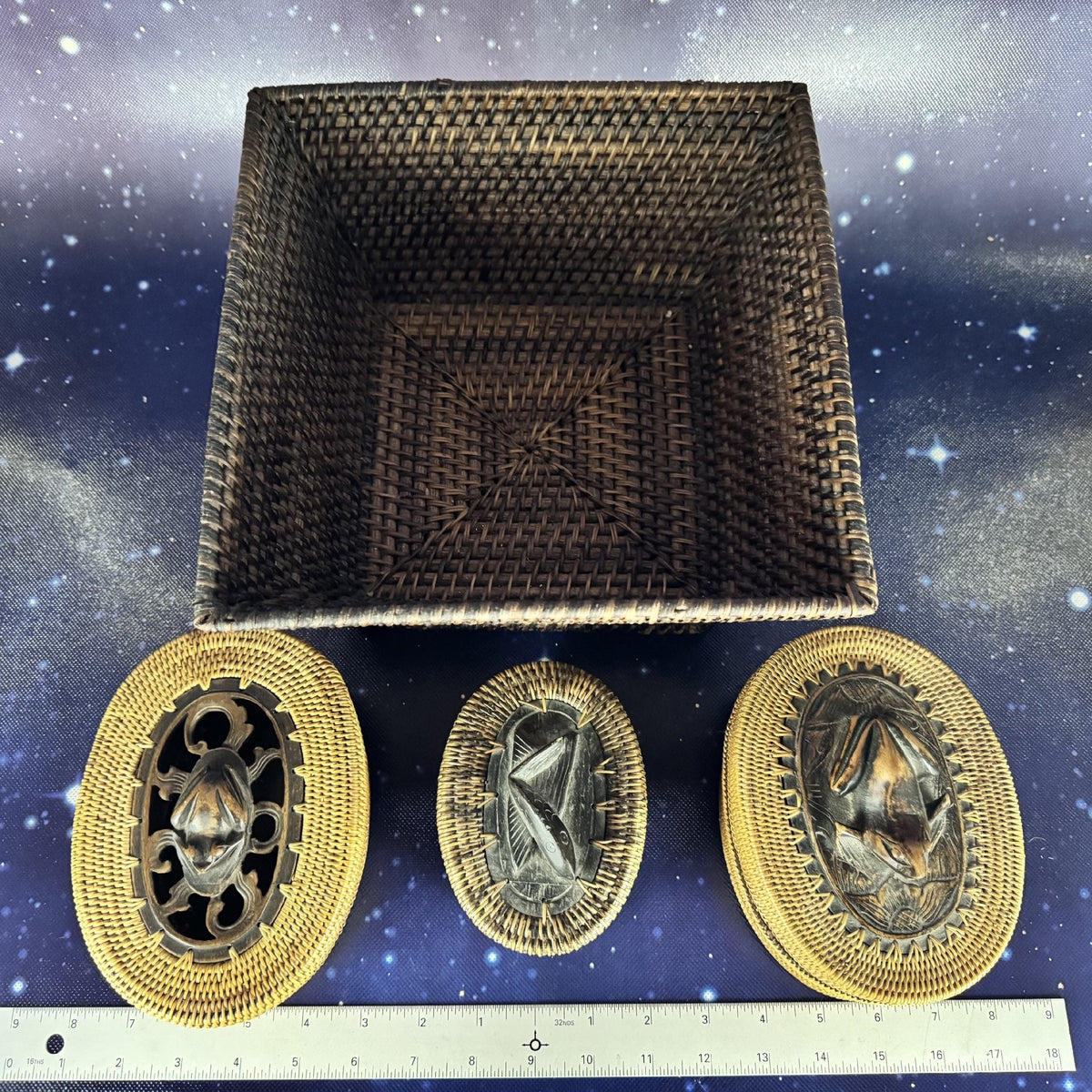Three Oval-Lidded Woven Boxes with Carved Wooden Animal Figurines and Square Woven Container
