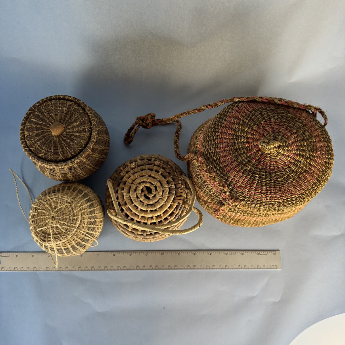 Four Lidded, Woven Baskets