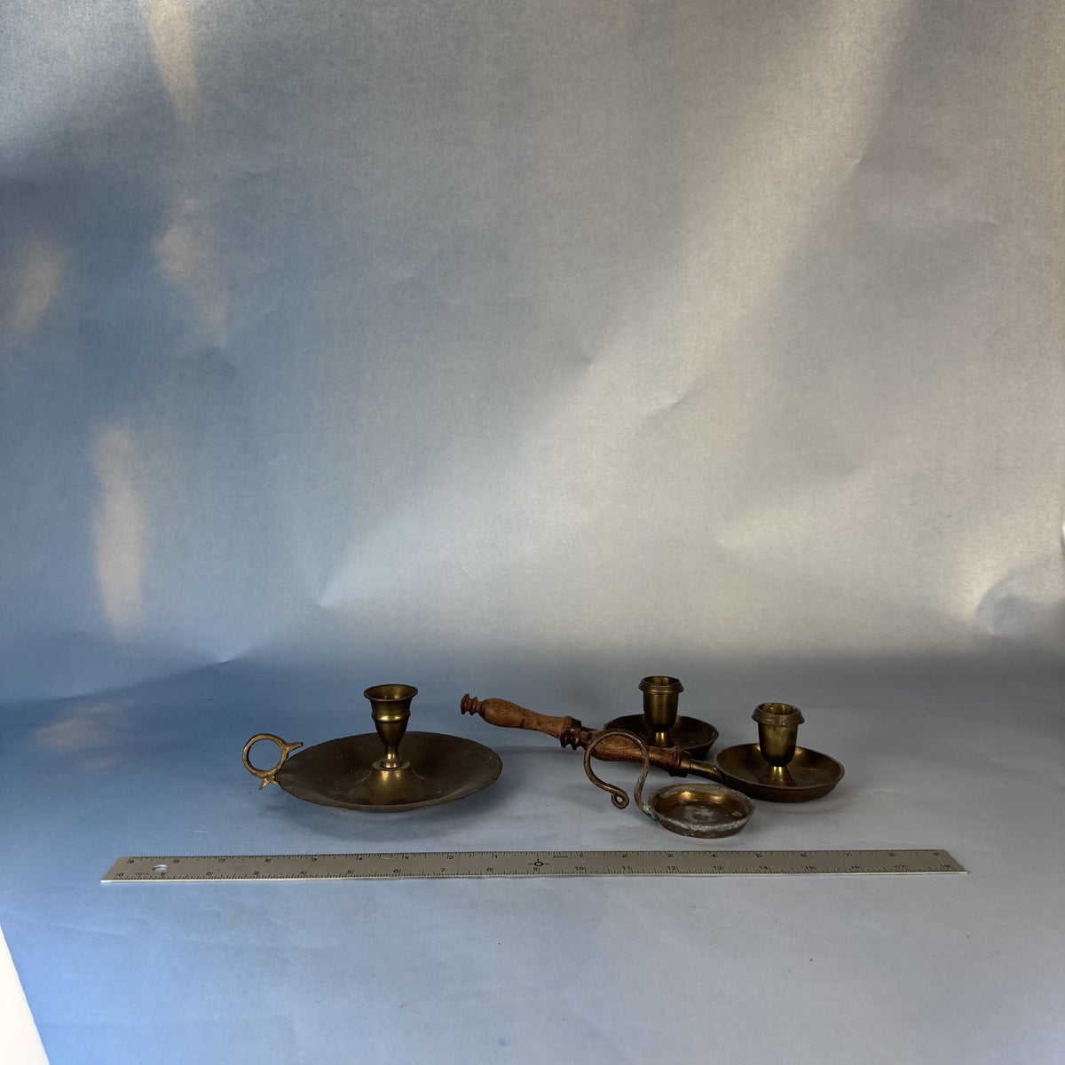 Set of Four Brass Candlestick Holders