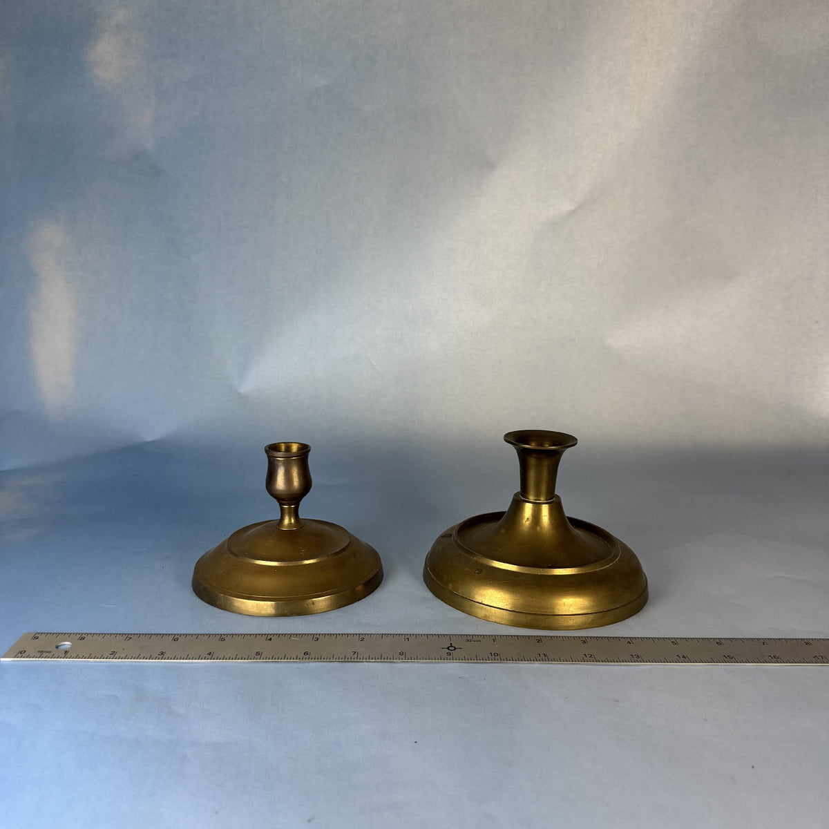 Unmatched Pair of Brass Candlestick Holders