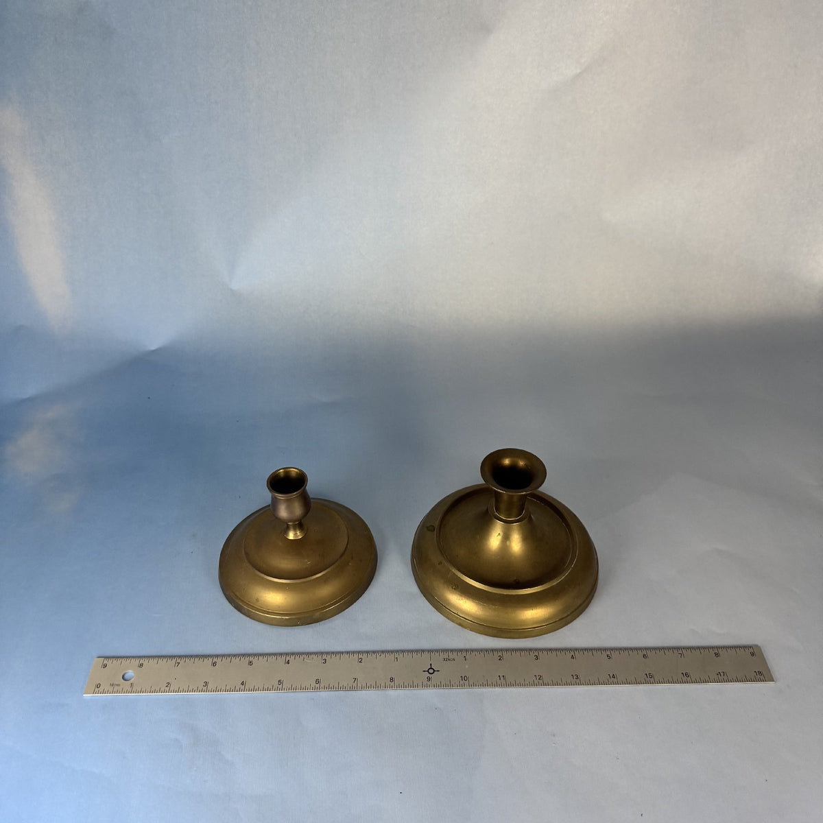 Unmatched Pair of Brass Candlestick Holders
