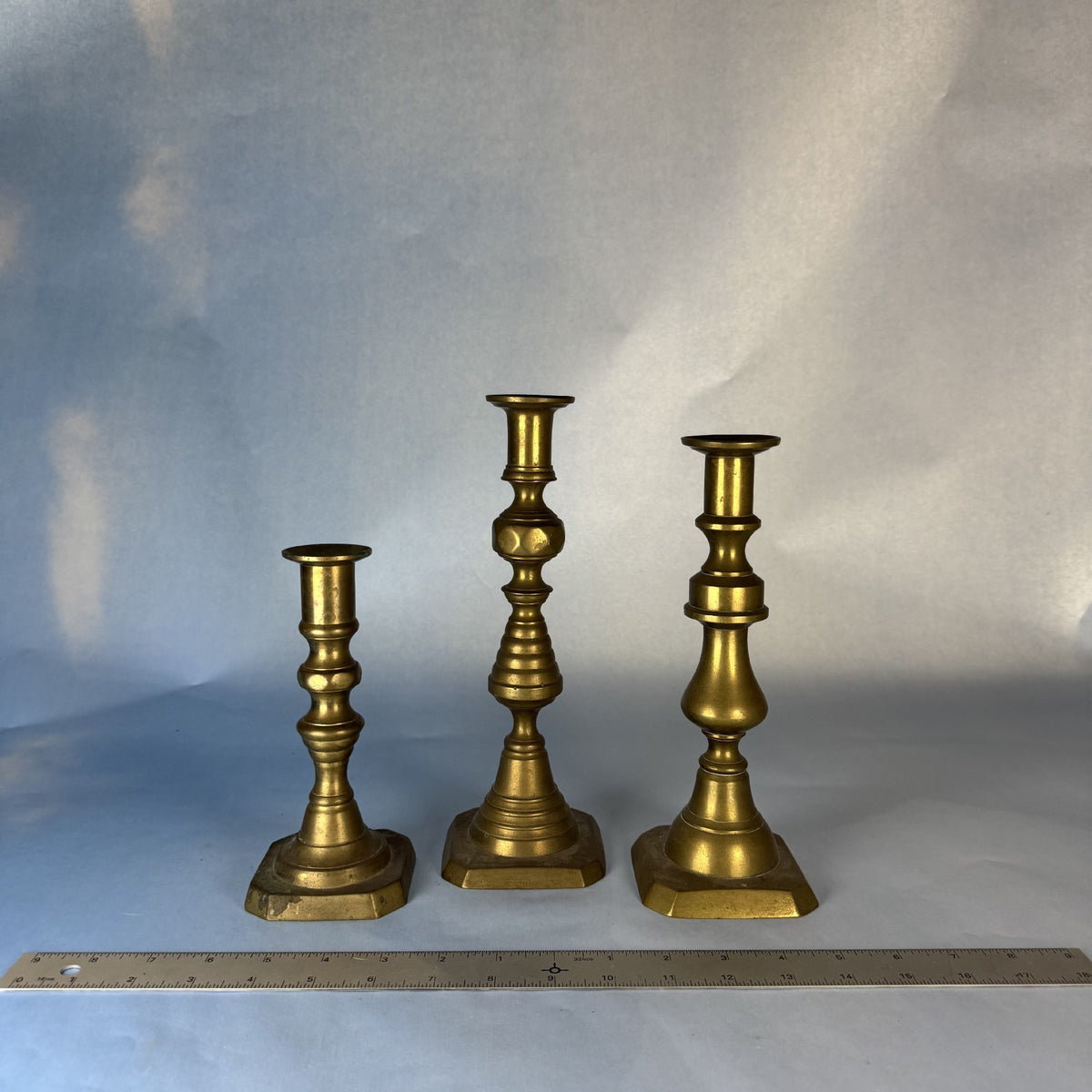 Trio of Brass Candlesticks