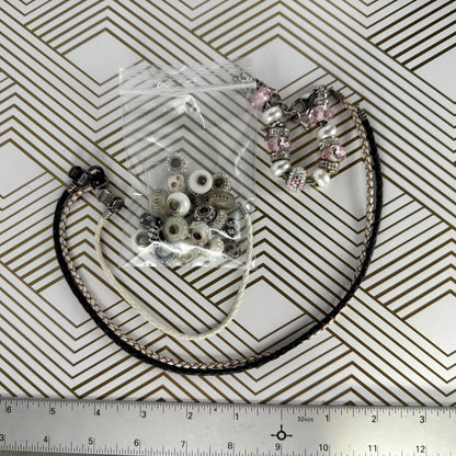 Collection of Pandora Beads and Leather Cords in Pink, Black and White