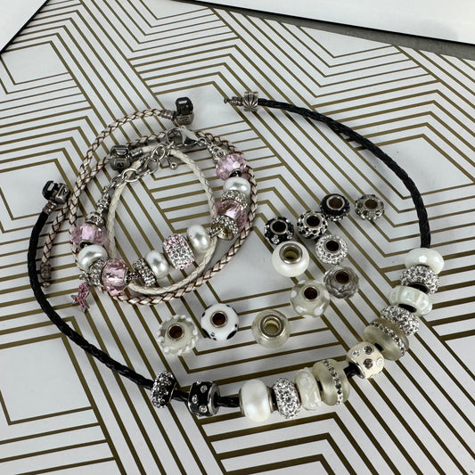 Beaded bracelet with pearls and crystals on a patterned background