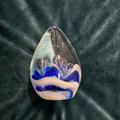 Egg-shaped Glass Paperweight with Blue Splash Design