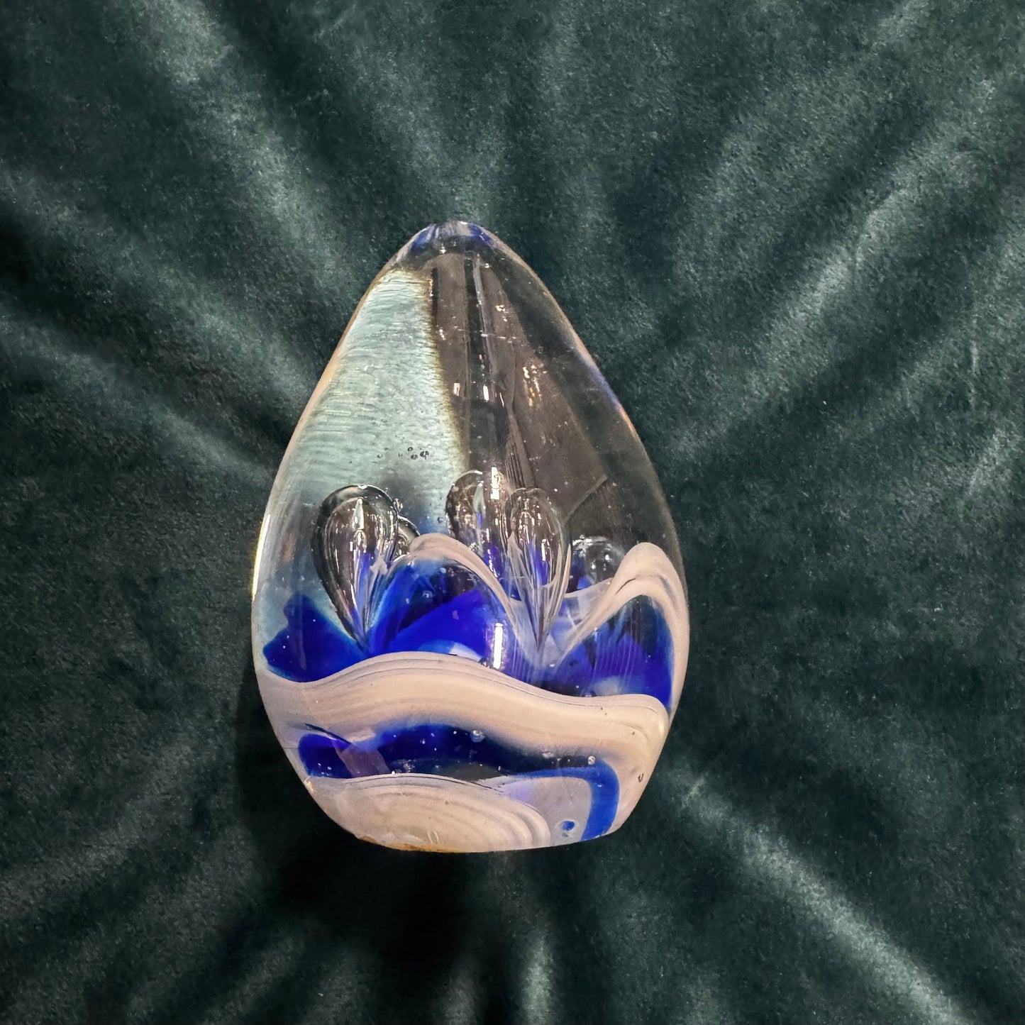 Egg-shaped Glass Paperweight with Blue Splash Design